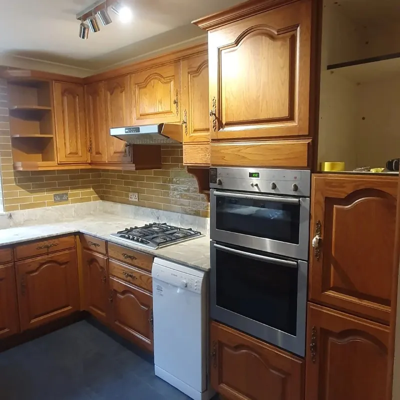Kitchen cabinets before Neptune Mist respray