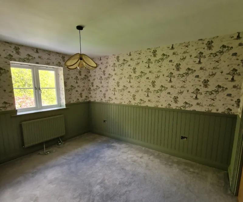 Nursery after redecoration with Winnie the Pooh wallpaper