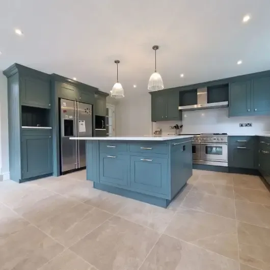 Professional kitchen spraying by Caulfield Custom Decor